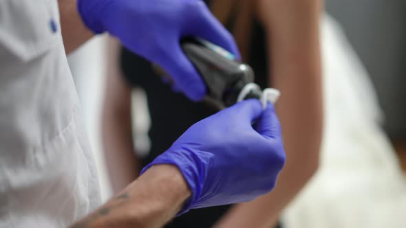 Unrecognizable Doctor Disinfecting Female Arm Before Coronavirus Vaccine Injection