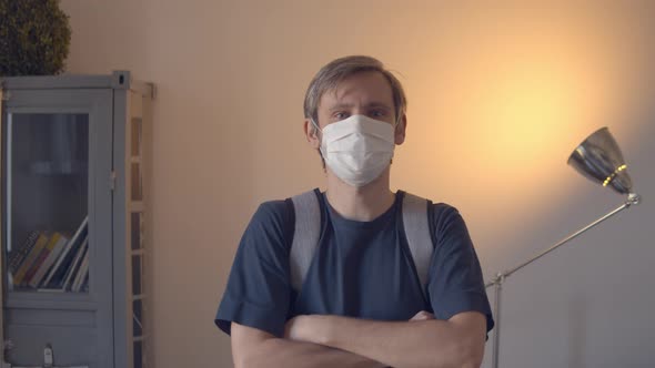 COVID19 Man in Office Wearing Face Mask Protective for Spreading of Coronavirus Disease in Europe