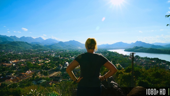 Back View of Woman Enjoying Landscape Viewpoint of Luang Prabang, Laos