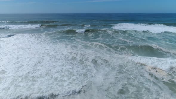 Slow Motion Sun Ocean Bay Waves Crash Aerial