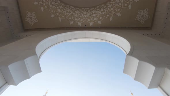 Architectural details of Sheikh Zayed Grand Mosque, Abu Dhabi. Tilt down shot