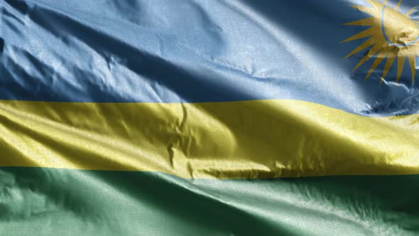 Rwanda textile flag waving on the wind. Slow motion. 20 seconds loop.