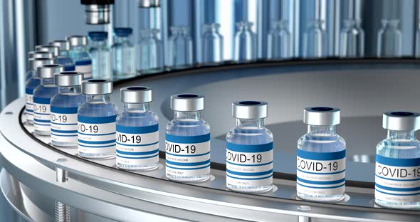 SARSCOV2 COVID19 Mass Production of Coronavirus Vaccine a Machine Pours the Vaccine Seals Bottle alt
