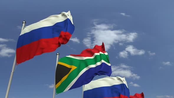 Row of Waving Flags of South Africa and Russia