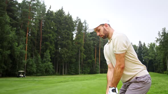 Young golfer playing golf on a golf course