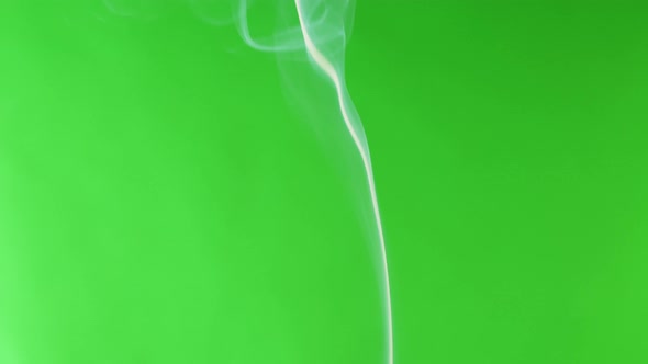 Smoke Jet on Green Chroma Key Background alt