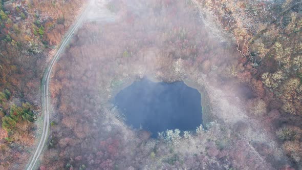 Aerial View of Bonny Glen in County Donegal with Fog  Ireland