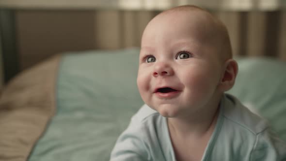 7 Month Old Boy Laughs Close Up