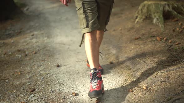 Slow motion shot of hiker with red hiking shoes