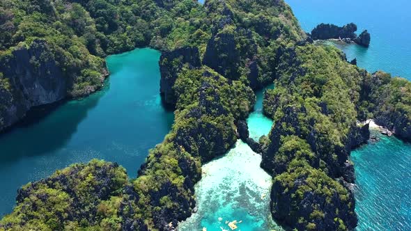 High flying aerial shot of big lagoon and small lagoon, El nido, Palawan, Philippines