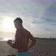 One young man running and enjoying summer in a beach alone with sunset - VideoHive Item for Sale