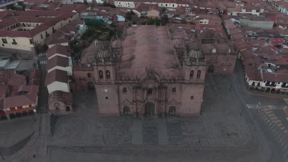 4k daytime aerial drone footage over the main Cathedral from Plaza de Armas in Cusco, Peru during Co