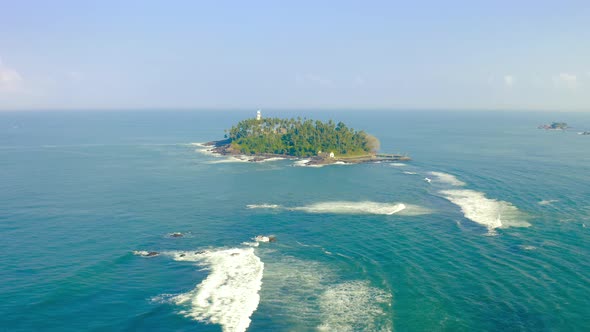 Beautiful Old White Lighthouse on Triopical Island