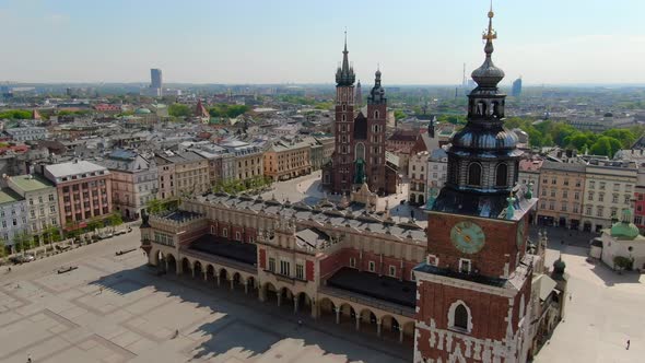 Flying over Main Square, Rynek Glowny in Krakow, Cracow city in Poland, Polska