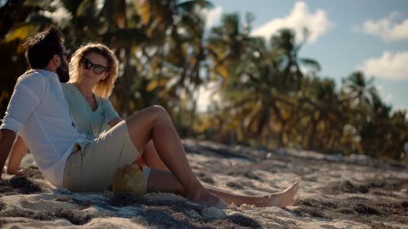 Couple Enjoying Relaxing Ocean On Caribbean Resort. Honeymoon Holidays On Maldives Or Bahamas.