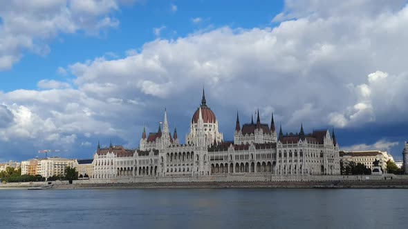 Static shot of Hungarian Parliament Building by Danube River, Budapest