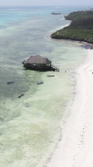 Vertical Video House on Stilts in the Ocean on the Coast of Zanzibar Tanzania