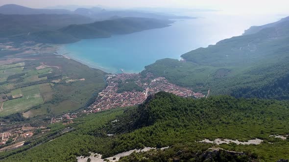 A Small City on a Forested Bay and Fertile Alluvial Plain by the Sea