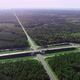 Aerial View of a Traffic Intersection with Moving Cars and Trucks - VideoHive Item for Sale