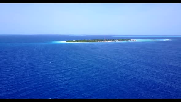 Aerial above landscape of luxury lagoon beach journey by aqua blue sea and white sandy background of