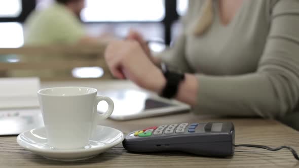 Pay using NFC technology using smart watches.