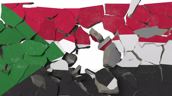Destroying Wall with Painted Flag of Sudan alt