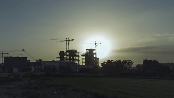 Mriehel Quads highrise in Malta in the early hours. Timelapse of sunrise