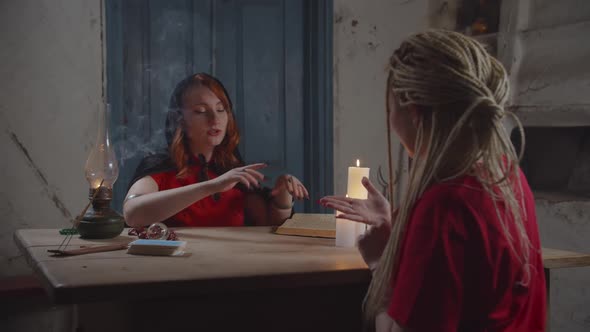 Female Hand Reader Practicing Chiromancy Indoors