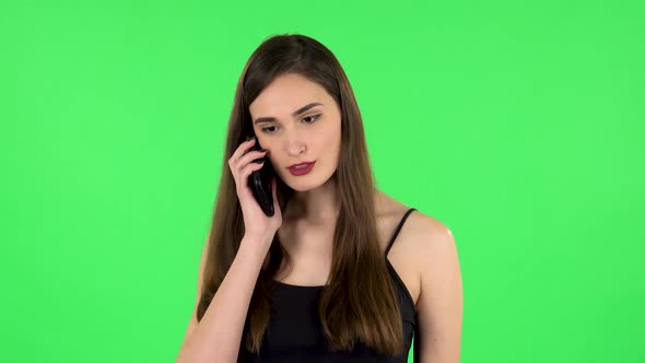 Portrait of Girl Talking for Mobile Phone. Green Screen