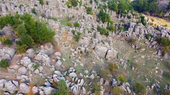 Aerial View of Unusual Rock Formations on Mountain Slopes