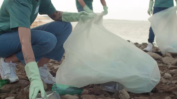 Eco Activists Cleaning Sea Coast