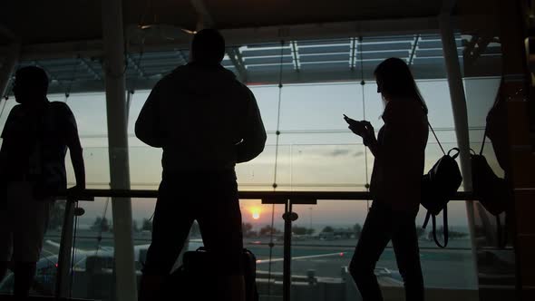 People at the Airport Waiting for a Flight