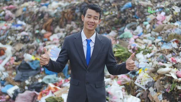 Businessman Thumbs Up And Smiling