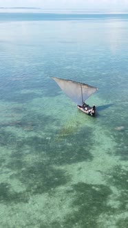 Vertical Video Boats in the Ocean Near the Coast of Zanzibar Tanzania