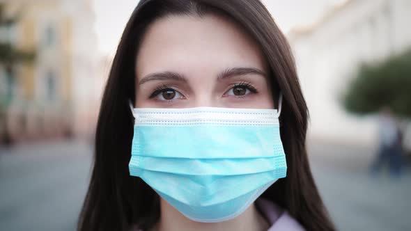 Young Hispanic Woman Wearing Protective Mask Against COVID Virus Tourist with Medical Mask Public