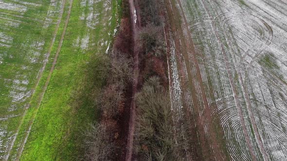 Drone flight over winter field thuringia