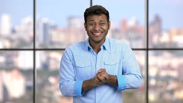 Young Indian Man Is Laughing Hard To Camera