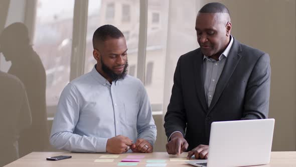 Two African American Business Men Afro Mature Boss Leader and Black Ethnic Manager Worker Working