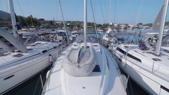 Exterior view of a sailboat boat deck and lifeboat dinghy.