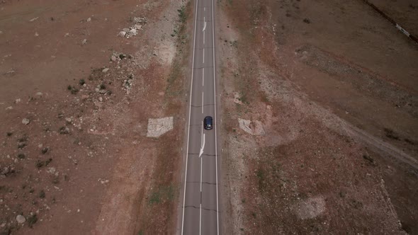 Chuya highway with traffic cars and mountains in valley of Altai