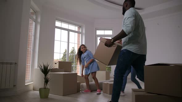 Family Moving To New House, Giving High Five