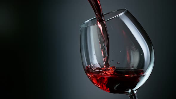 Super Slow Motion Shot of Pouring Red Wine Into Glass at 1000Fps