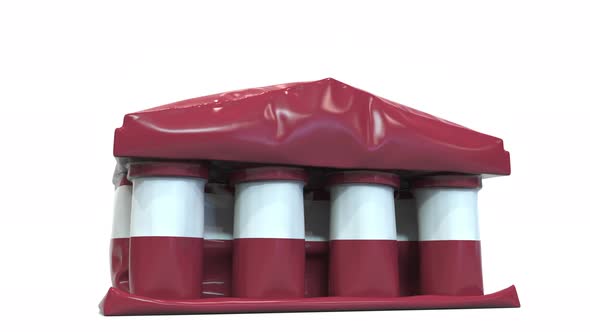 Deflating Bank or Government Building with Flag of Latvia alt
