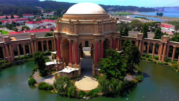 Close up drone shot flying away from the Palace of Fine Arts in San Francisco, California.