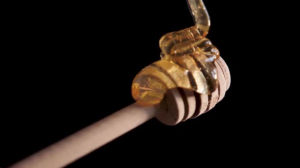 Honey Stick on a Black Background