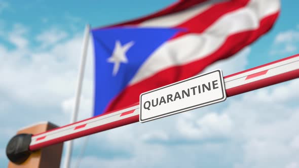 Opening Boom Barrier with QUARANTINE Sign at Flag of Puerto Rico