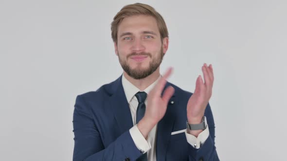 Young Businessman Clapping Applauding on White Background