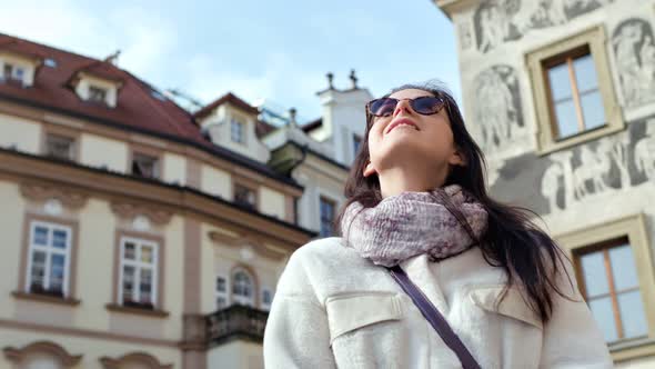 Low Angle Carefree Woman Tourist Admiring Amazing Architecture Building Medium Closeup