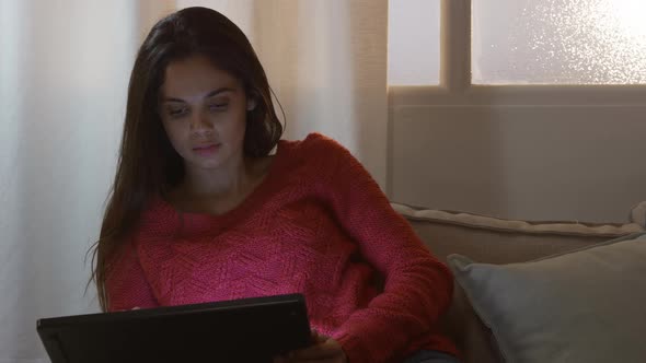 Caucasian woman using a laptop