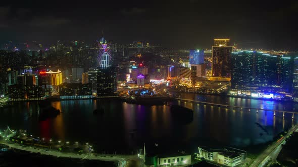 Macau Peninsula Aerial Cityscape Night Timelapse Pan Up